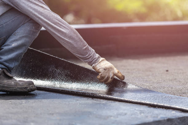 Professional Waterproofing technician working in Towanda, KS